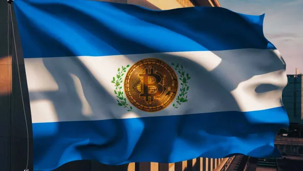 Le drapeau du Salvador avec un symbole Bitcoin au centre, flottant au vent.