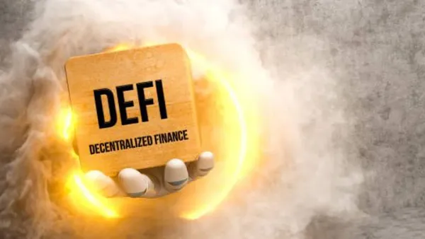 Un cube en bois avec l'inscription DEFI (Decentralized Finance) est tenu par une main robotique, entouré d'une aura lumineuse et de fumée.