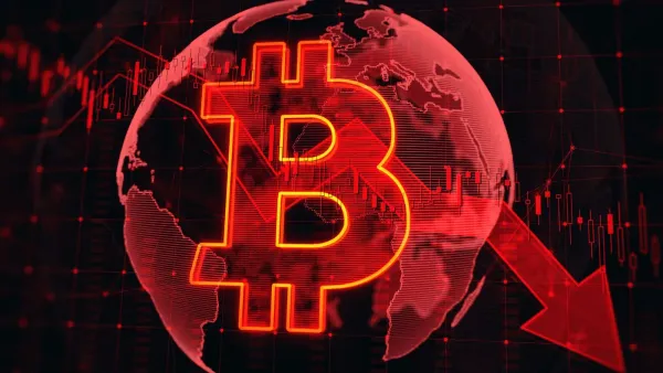 Image conceptuelle montrant une baisse du Bitcoin avec un symbole Bitcoin rouge sur un globe terrestre et un graphique boursier en baisse.