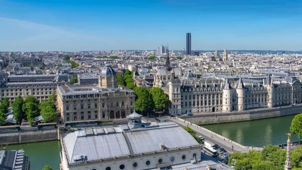 Vue panoramique de Paris avec des bâtiments historiques et la Seine, évoquant un environnement urbain où des SCPI pourraient être affectées par des événements économiques.